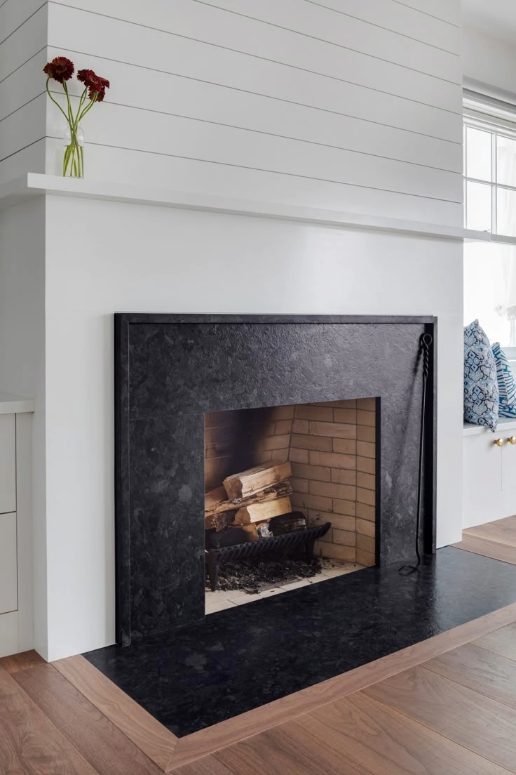 Black stone fireplace surround